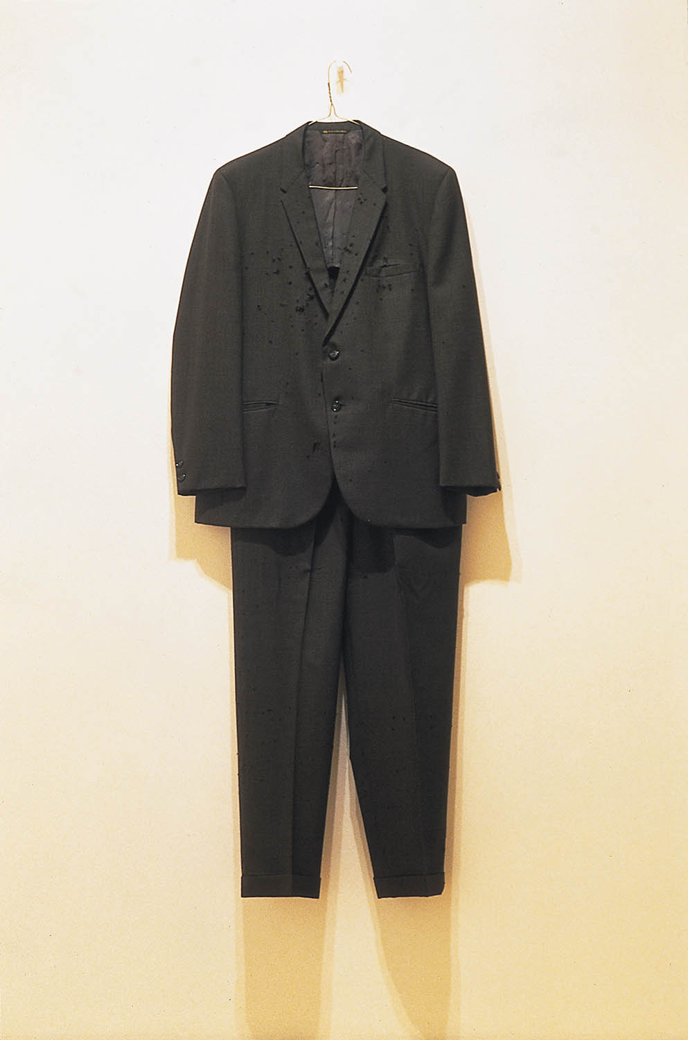 SUIT, SHOT WITH SMALL CHANGE, 1995